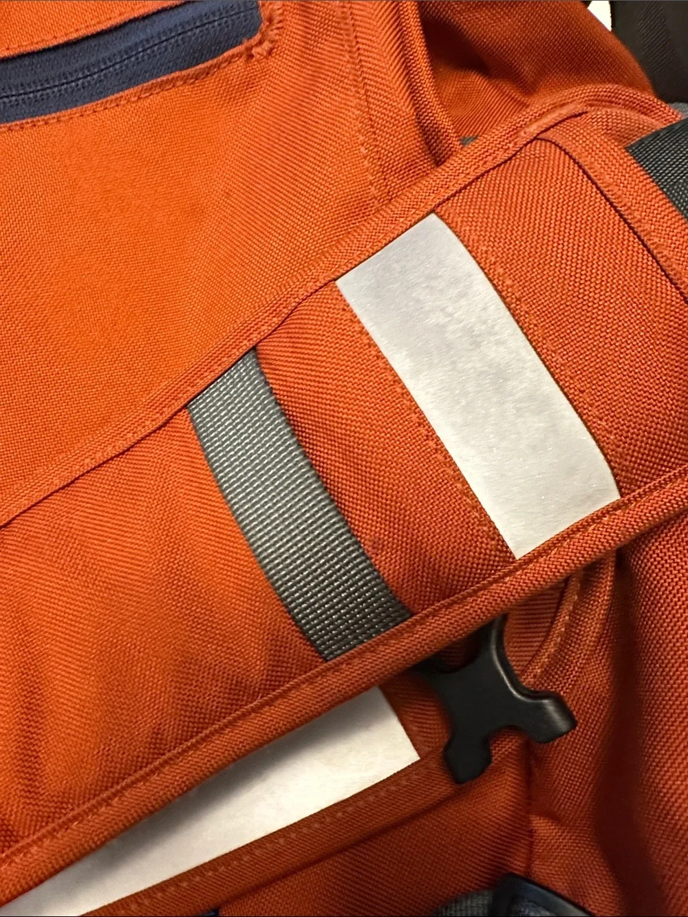 Patagonia Orange Men’s Messenger Bag with Reflective Accent